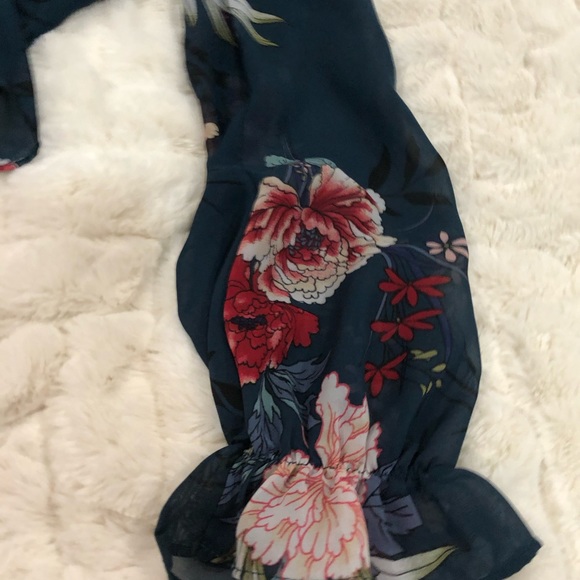 Floral crop top with sheer sleeves; button for front closure, ruffle trim bottom - Picture 8 of 9